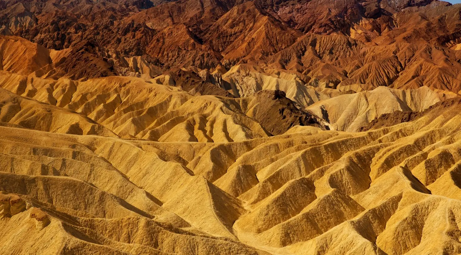 Golden eroded hills at Zabriskie Point