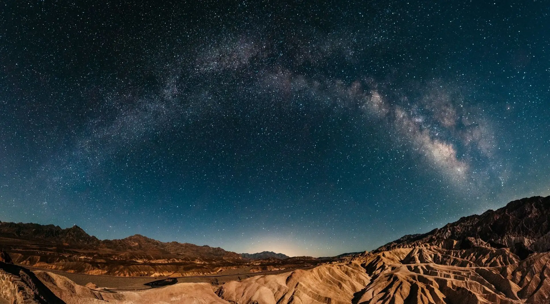 Milky Way over a desert landscape
