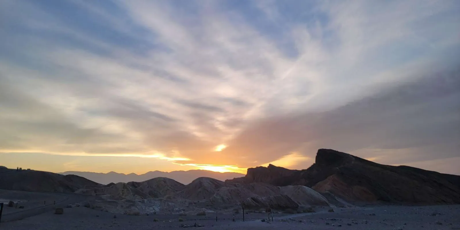 Sunset over a broad mountain basin