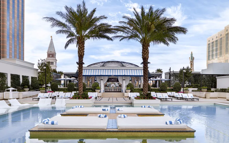 Pool and palm trees at The Venetian Resort Las Vegas