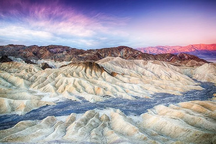 Folded badlands in soft evening light