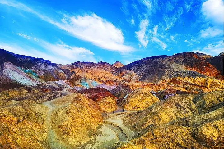 Colorful mineral slopes under a blue sky