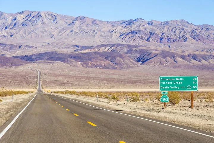 Desert highway approaching mountain country