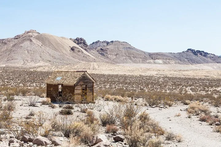 Historic structures in a dry desert landscape
